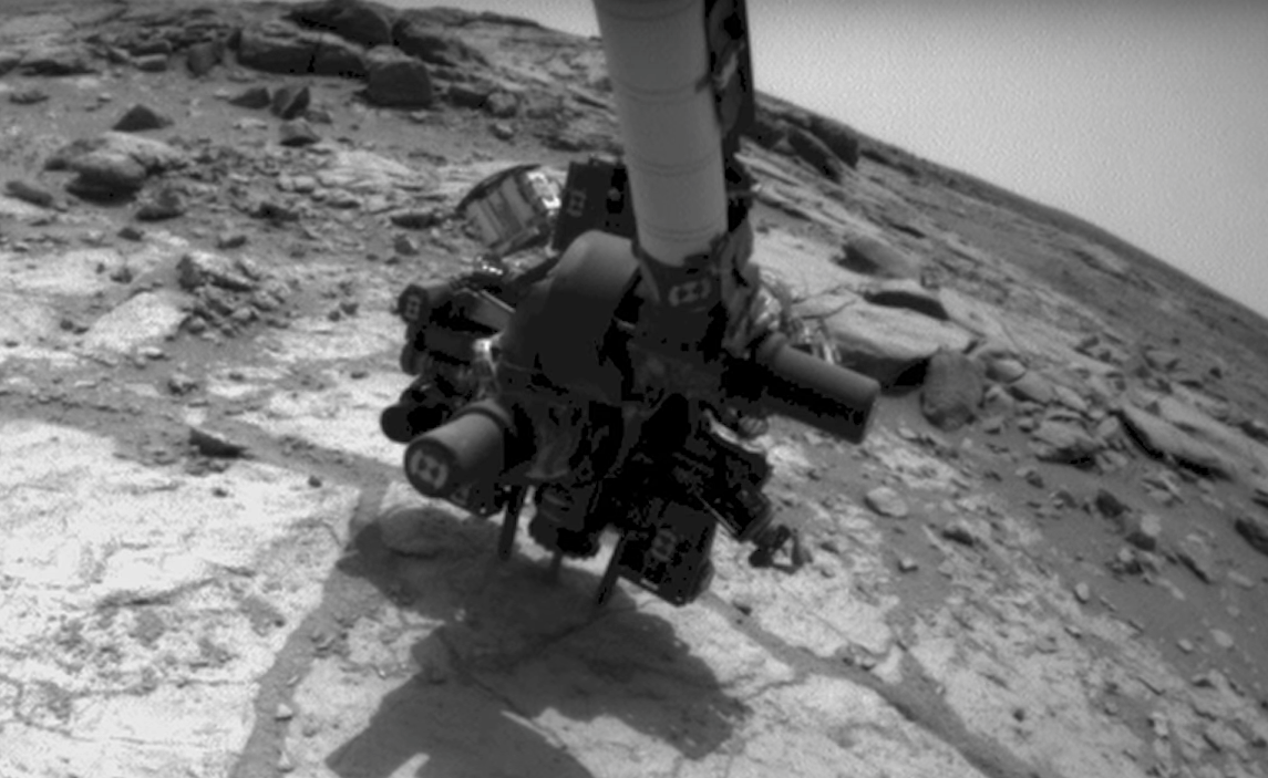 MSL drill acquiring a sample on Mars.