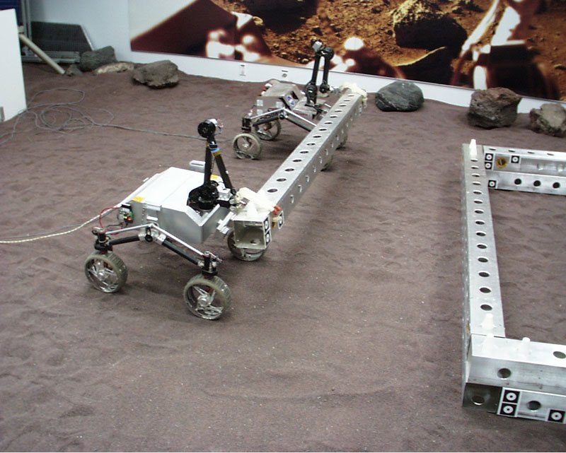 Fig. 3: PRL-based research in multi-rover coordination for conceptual lunar-surface assembly operations.