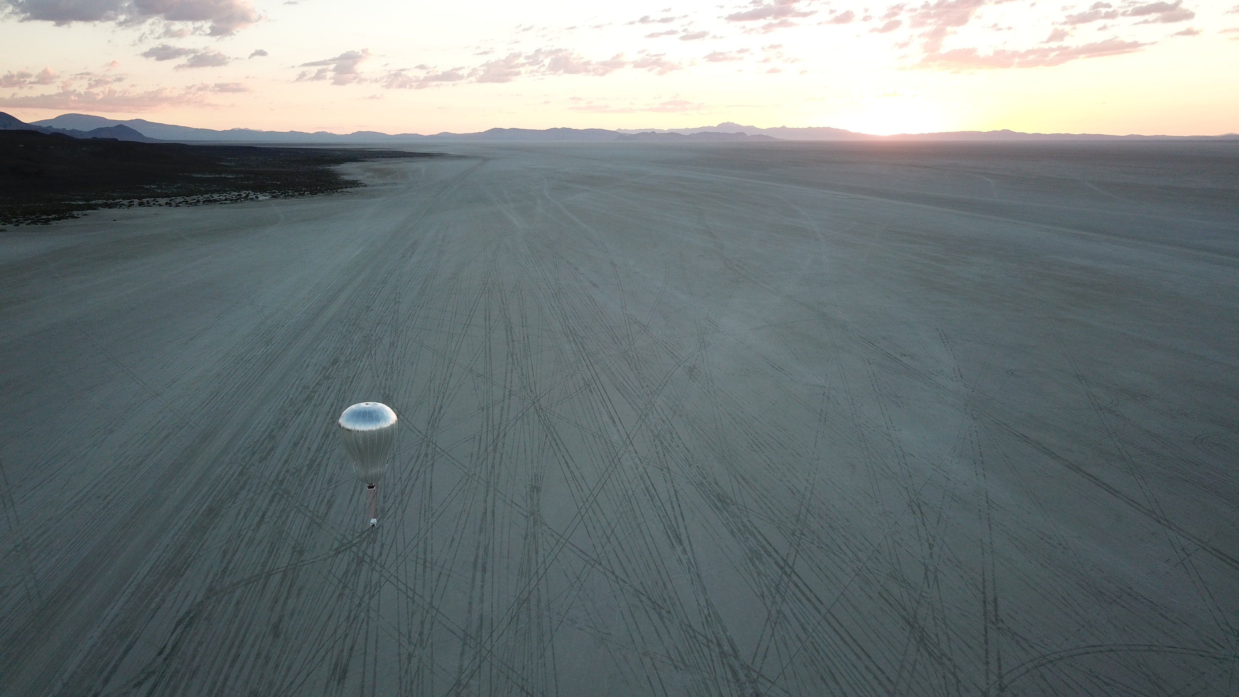 Picture: Prototype Venus aerobot in its second flight, at sunrise.
