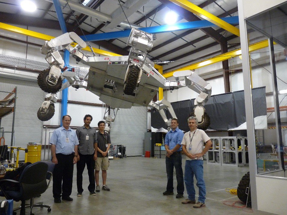 Fig 7. ATHLETE crew standing in front of the low gravity testbed