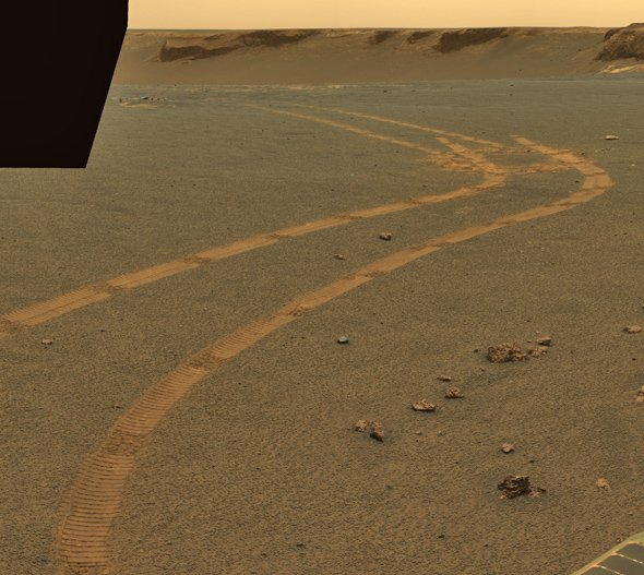 Rover tracks on Mars.